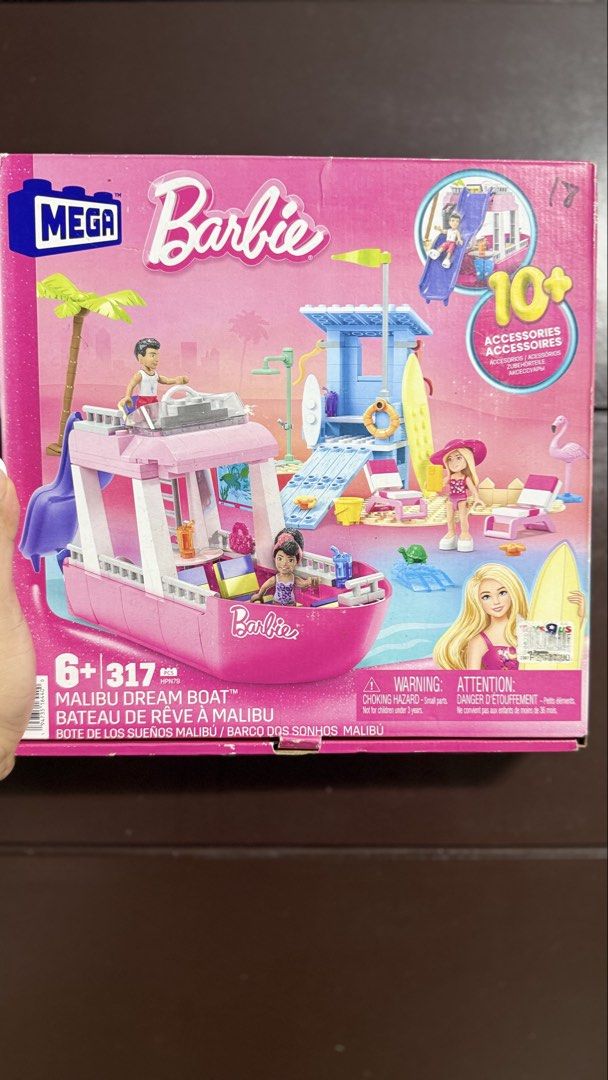 Barbie Malibu Dream Boat (Category: Kids Toys) located in Manila. Submitted by evarosefernandez (Listing ID 1443310416, Image 3). Description: - Mega Barbie Malibu Dream Boat building set - Includes boat and lifeguard tower - Comes with various accessories, figures, and beach elements - Offers hours of creative building and imaginative play - Ideal for any Barbie fan -Pieces still sealed -MOP: Gcash, BDO.