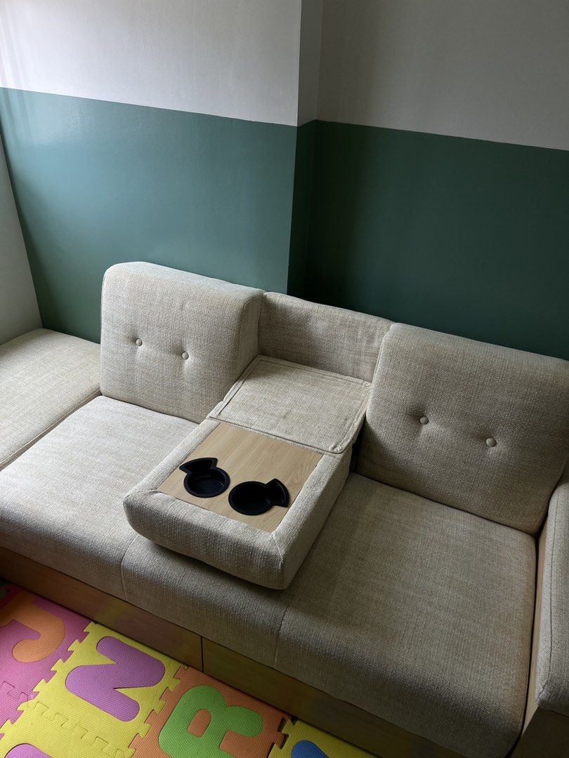Beige L-Shaped Sofa (Category: Sofas) located in Manila. Submitted by beadeegee (Listing ID 1443159072, Image 2). Description: - Modular sections, you can choose the L-shape orientation (very flexible) - Convertible to Sofa bed - Space saving sofa (fit into our 29sqm condo) - Comfortable and strong - with storages and cup holders - Perfect for condos - Bought in Modish Cave in March 2024 - Location: Cainta Rizal near Sta. Lucia Mall RFS: Need mor