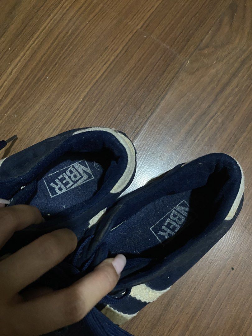 BER Navy Blue Sneakers with White Stripes (Category: Sneakers) located in San Juan City. Submitted by helpabaddietodecclutter (Listing ID 1443132513, Image 2). Description: - BER Navy Blue Sneakers - Features a classic white stripe design - Lace-up closure for a secure fit - Size 37 (UK 4 / US 6) - 'BER since 1994' branding visible on the sole - Shows minor signs of dust and wear, adding character - Perfect for everyday casual wear.