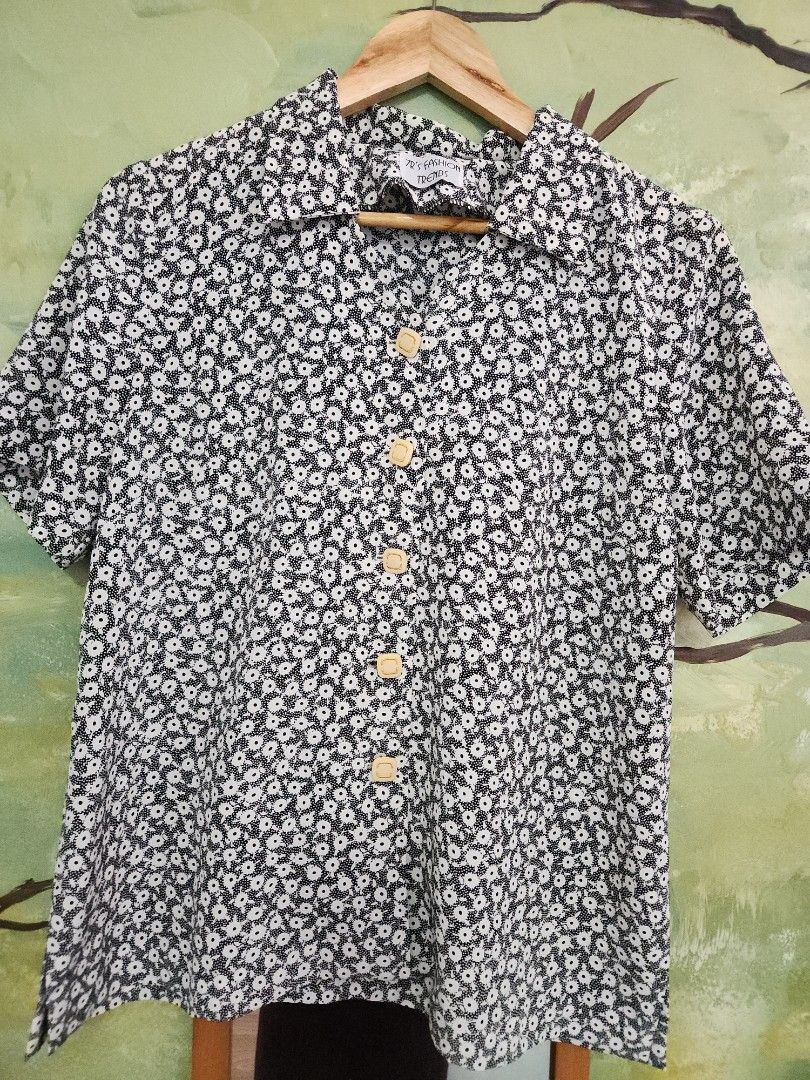 Vintage Floral Button-Up Blouse (Category: Blouses) located in Makati City. Submitted by abbydeclutters (Listing ID 1443293013, Image 1). Description: Vintage black and white floral blouse w/ cute buttons. Was my mom's from the 90s. Still feels newish. Fits til medium.
