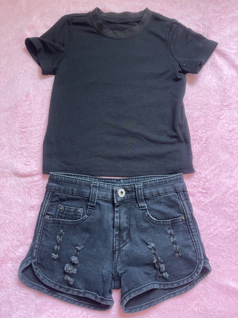 Black Graphic Tee & Distressed Denim Shorts Set (Category: Sets or Coordinates) located in Paombong. Submitted by declutteredbychee_ (Listing ID 1443193706, Image 1). Description: - Black graphic t-shirt with 'DON'T TRIP OVER WHAT'S BEHIND YOU' print on the back. - Black distressed denim shorts with raw hem and ripped details. - Stylish and comfortable casual outfit. - Ready to wear..