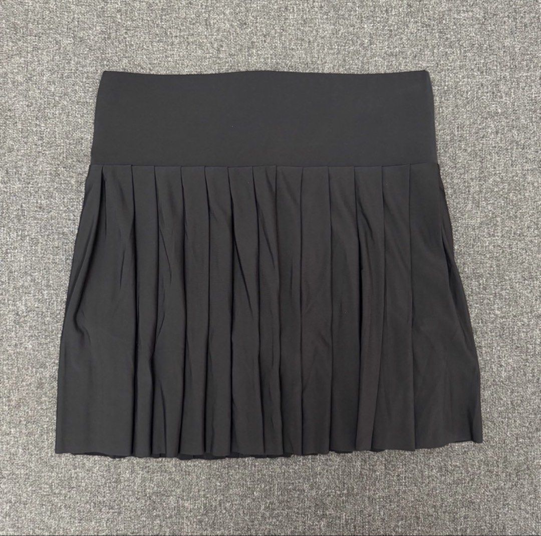 Black Pleated Tennis Skirt (Category: Activewear) located in Quezon City. Submitted by 0000626 (Listing ID 1443149808, Image 1). Description: - Black pleated skirt - Wide waistband - Built-in shorts for comfort and security - Small zippered pocket at the back waistband - Ideal for sports, workouts, or everyday casual wear - Designed for comfort and ease of movement Helping tags: Pickleball Tennis Activewear Airactive .