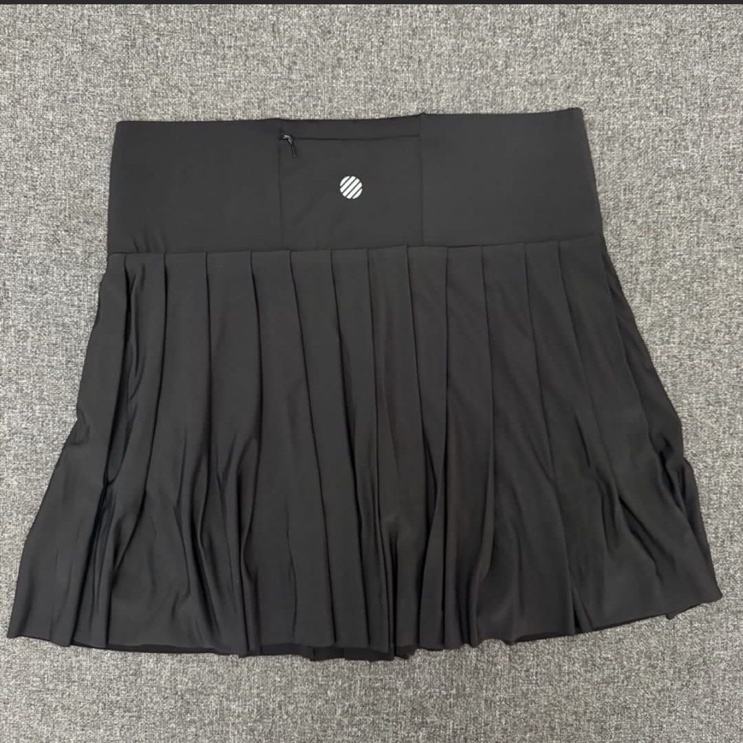 Black Pleated Tennis Skirt (Category: Activewear) located in Quezon City. Submitted by 0000626 (Listing ID 1443149808, Image 2). Description: - Black pleated skirt - Wide waistband - Built-in shorts for comfort and security - Small zippered pocket at the back waistband - Ideal for sports, workouts, or everyday casual wear - Designed for comfort and ease of movement Helping tags: Pickleball Tennis Activewear Airactive .