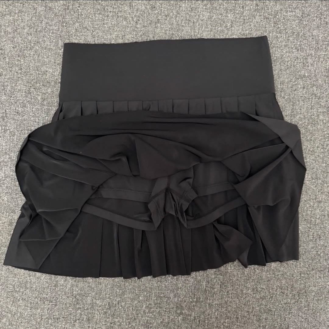 Black Pleated Tennis Skirt (Category: Activewear) located in Quezon City. Submitted by 0000626 (Listing ID 1443149808, Image 3). Description: - Black pleated skirt - Wide waistband - Built-in shorts for comfort and security - Small zippered pocket at the back waistband - Ideal for sports, workouts, or everyday casual wear - Designed for comfort and ease of movement Helping tags: Pickleball Tennis Activewear Airactive .