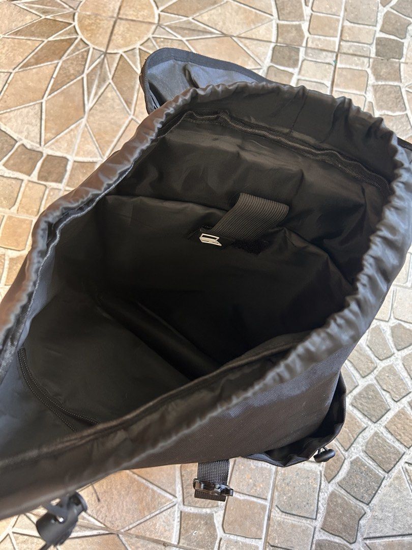 Black Roll Top Backpack with Buckle Straps (Category: Backpacks) located in Taguig. Submitted by rjfp.0214 (Listing ID 1443126258, Image 3). Description: - Sleek black roll top backpack - Secure buckle straps on the front - Comfortable padded shoulder straps - Main compartment with drawstring closure - Additional zippered pocket on the back - Ideal for everyday use and travel.