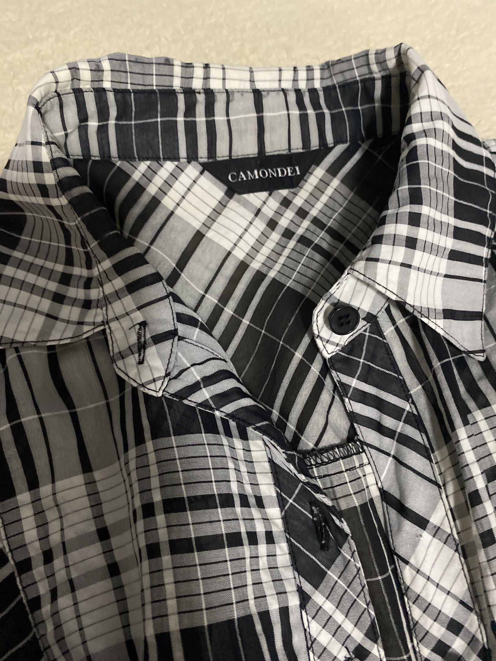 button up womens polo blouse black and white (Category: Blouses) located in Paranaque City. Submitted by whitegummy (Listing ID 1443198732, Image 2). Description: top button is gone! but not really necessary since its not used grunge acubi y2k skater .