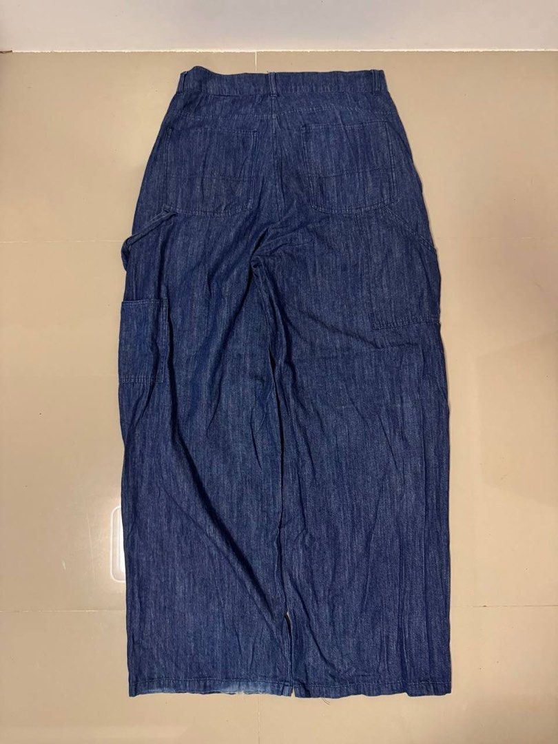 Carpenter Raw Blue Denim Wide Leg Pants (Category: Jeans) located in Lupi. Submitted by shittynappy (Listing ID 1443251041, Image 2). Description: 📍 PM for Infos PSG ko😘 - Raw Blue pants - Wide leg Carepnter pants style - Multiple pockets - Button and zip front closure - Relaxed fit - Ideal for casual wear.