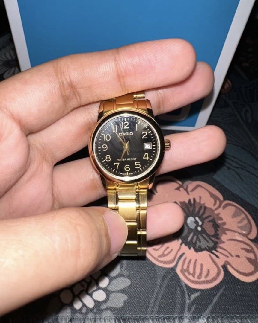 Casio Gold Tone Water Resist Watch (Category: Women's Watches) located in General Santos City (Dadiangas). Submitted by preloved_thingsssz (Listing ID 1443141866, Image 2). Description: - Gold tone Casio watch -Bought in SM - Classic black dial - Water resistant - Date window at 3 o'clock - Comes with original box - Ideal for everyday wear -Once lng nagamit.