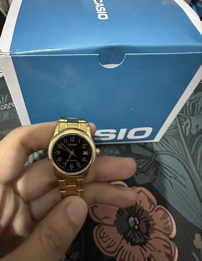 Casio Gold Tone Water Resist Watch (Category: Women's Watches) located in General Santos City (Dadiangas). Submitted by preloved_thingsssz (Listing ID 1443141866, Image 3). Description: - Gold tone Casio watch -Bought in SM - Classic black dial - Water resistant - Date window at 3 o'clock - Comes with original box - Ideal for everyday wear -Once lng nagamit.
