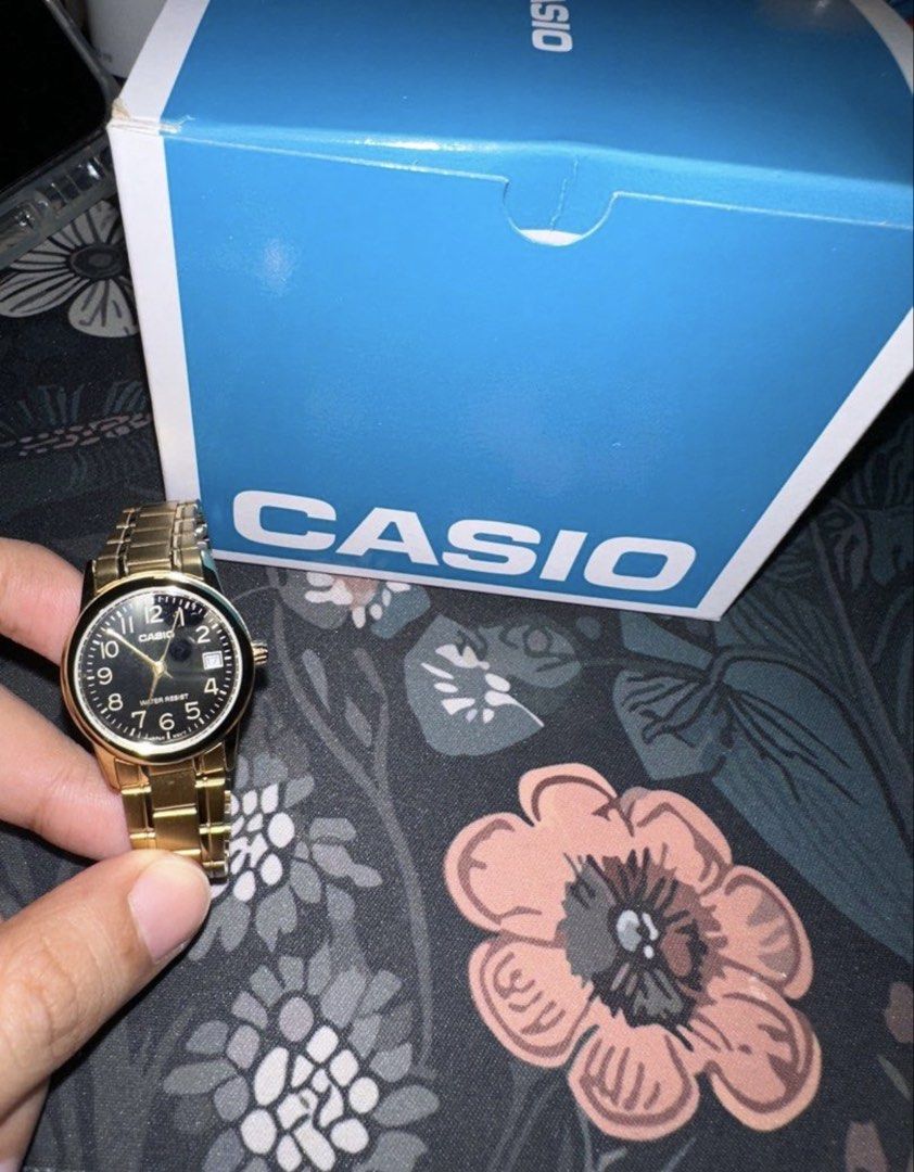 Casio Gold Tone Water Resist Watch (Category: Women's Watches) located in General Santos City (Dadiangas). Submitted by preloved_thingsssz (Listing ID 1443141866, Image 1). Description: - Gold tone Casio watch -Bought in SM - Classic black dial - Water resistant - Date window at 3 o'clock - Comes with original box - Ideal for everyday wear -Once lng nagamit.
