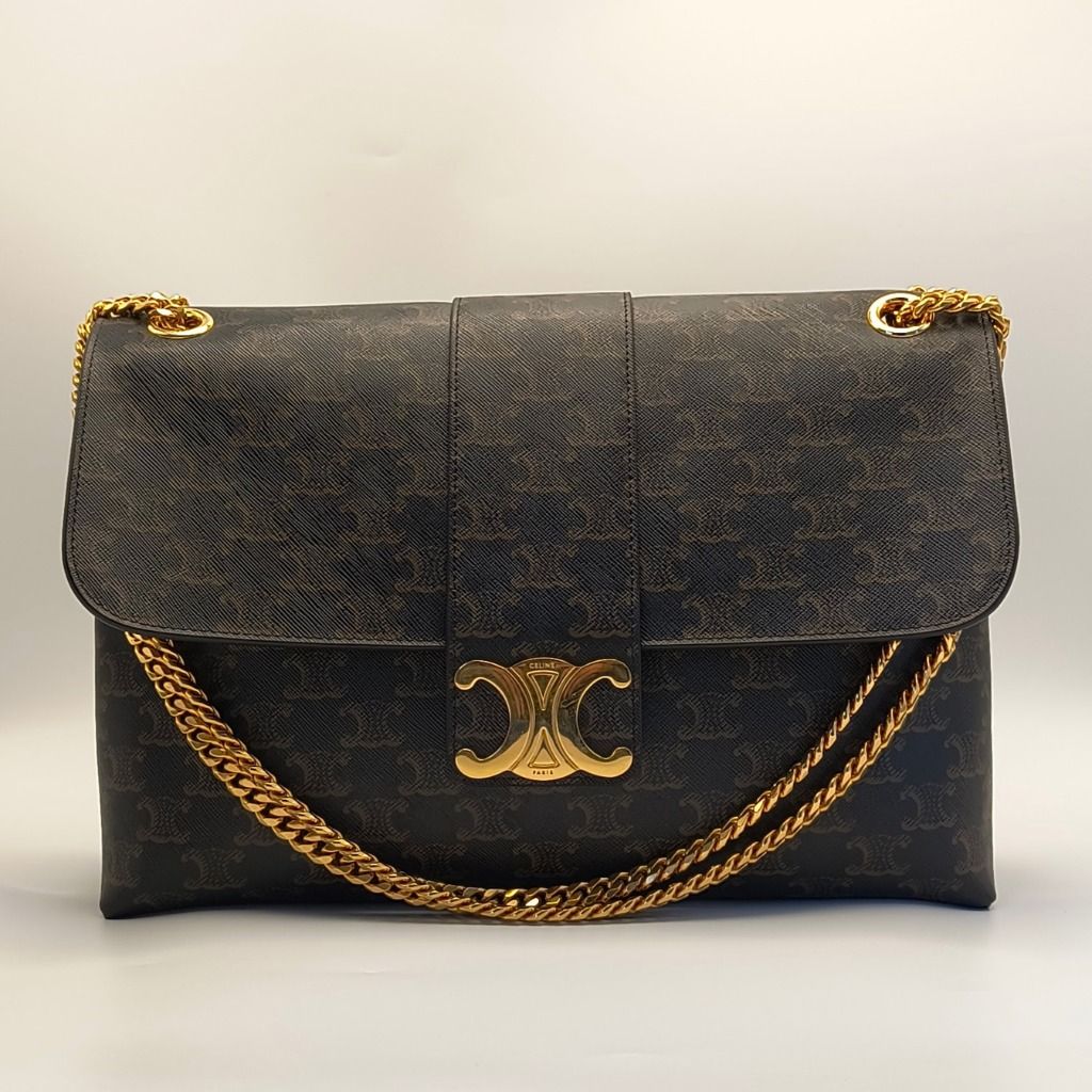 Celine Triomphe Monogram Chain Shoulder Bag (Category: Luxury Bags & Wallets) located in Cebu City. Submitted by theluxxaffair (Listing ID 1443243838, Image 1). Description: Celine Triomphe shoulder bag in signature Triomphe monogram canvas with gold-tone hardware. Features the iconic Triomphe clasp, sliding chain strap, and a structured flap silhouette. Lined in tan leather with multiple interior compartments and a zip pocket for organization. I