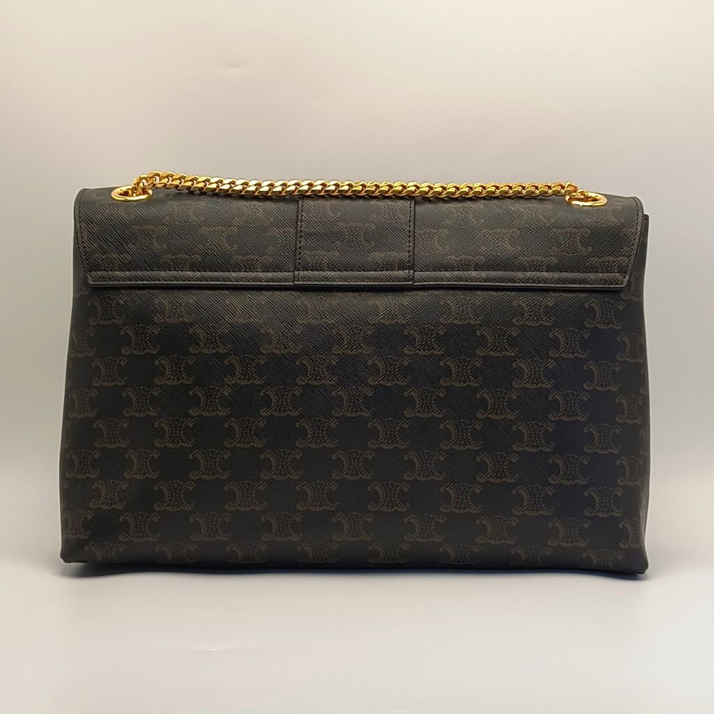 Celine Triomphe Monogram Chain Shoulder Bag (Category: Luxury Bags & Wallets) located in Cebu City. Submitted by theluxxaffair (Listing ID 1443243838, Image 3). Description: Celine Triomphe shoulder bag in signature Triomphe monogram canvas with gold-tone hardware. Features the iconic Triomphe clasp, sliding chain strap, and a structured flap silhouette. Lined in tan leather with multiple interior compartments and a zip pocket for organization. I