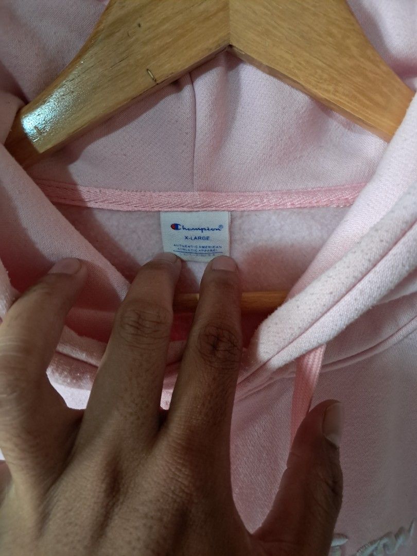 Champion Pink Hoodie (Category: Coats, Jackets and Outerwear) located in Silang. Submitted by segundalifestyle (Listing ID 1443258782, Image 3). Description: - Classic pink Champion hoodie - Embroidered Champion logo on front - Pink drawstrings for hood - Made from soft, comfortable material - Ideal for everyday casual wear - 19 x 24 inches Dimension .