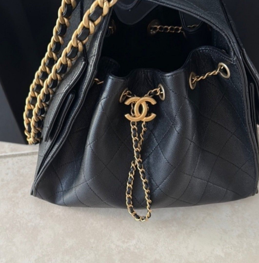 Chanel 25 caviar (Category: Luxury Bags & Wallets) located in Manila. Submitted by sunflower01234 (Listing ID 1443131774, Image 3). Description: - Classic Chanel drawstring bag - Black quilted leather - Gold chain details - Iconic CC logo charm - Spacious interior with pockets - Versatile for day or night - Timeless addition to any collection.