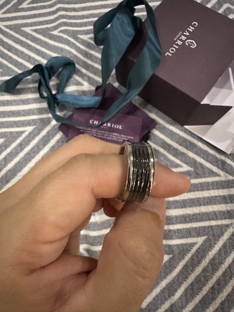 Charriol Ring (Category: Luxury Accessories) located in Manila. Submitted by mynameisdell (Listing ID 1443253258, Image 2). Description: - Authentic Charriol Geneva Ring - Features a textured black band - Comes with original box - Includes authenticity card - Purchase Date: 12.10.2025 - Model Reference: 02.03.1139.0 - Size 62 - A truly great piece!.