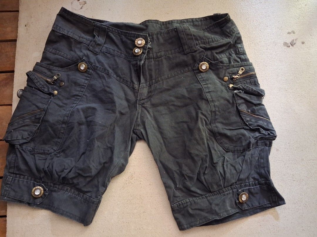 Dark Grey Cargo Shorts with Embellished Buttons (Category: Shorts) located in Cabanatuan. Submitted by ronnelpena (Listing ID 1443169923, Image 2). Description: - Dark grey wash cargo shorts - Multiple pockets with zip details - Button fly closure with subtle sparkle buttons - Cropped length with cuffed hem - Ideal for casual wear.