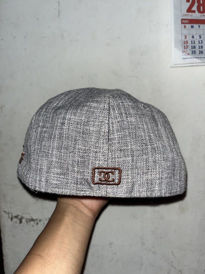 DC Shoes "Real Fire" Snapback Cap Grey DUPE (Category: Caps & Hats) located in Surigao. Submitted by hannxaii (Listing ID 1443173447, Image 3). Description: - Grey DC Shoes snapback cap - Classic DC logo embroidered in brown on the front - 'Real Fire' embroidery on the side - Small DC logo on the back - Size: 7 1/8 (57cm) - Ideal for any DC fan DUPE.