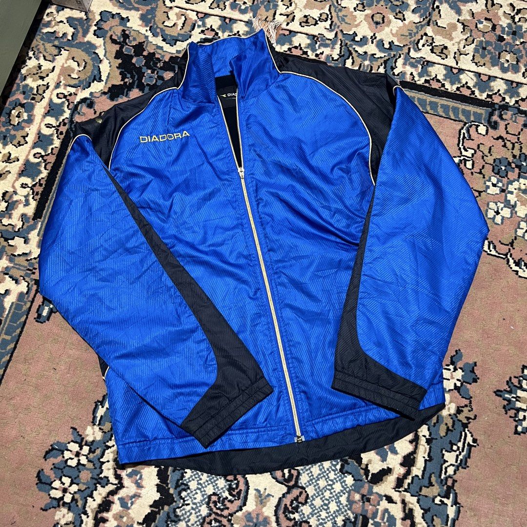 Diadora Mobara Soccer Jacket (Category: Coats, Jackets and Outerwear) located in Quezon City. Submitted by _carlnv (Listing ID 1443310968, Image 2). Description: - Embroidered Diadora logo on chest - Mobara Soccer graphic on the back - Full zip closure - 23x26.