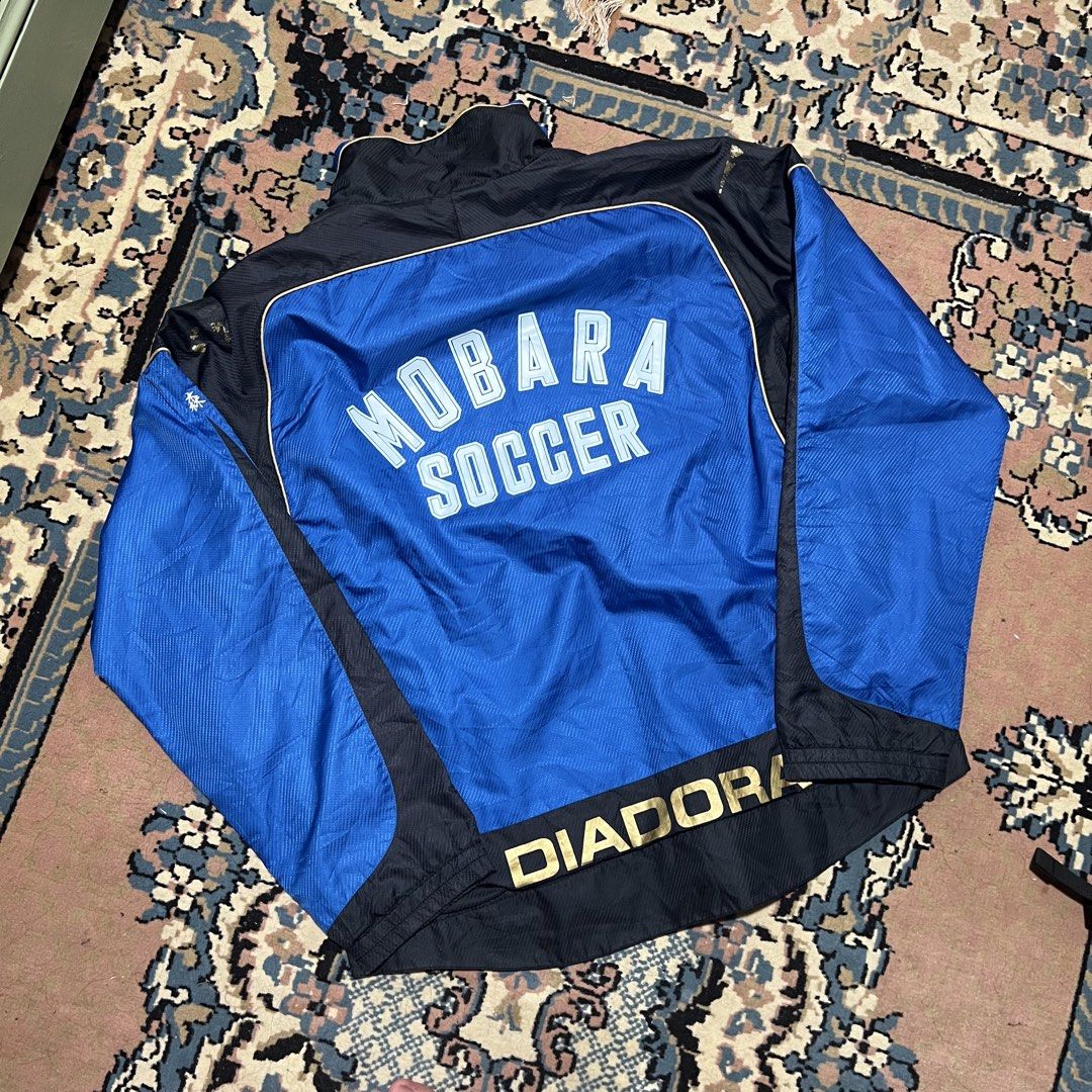 Diadora Mobara Soccer Jacket (Category: Coats, Jackets and Outerwear) located in Quezon City. Submitted by _carlnv (Listing ID 1443310968, Image 1). Description: - Embroidered Diadora logo on chest - Mobara Soccer graphic on the back - Full zip closure - 23x26.