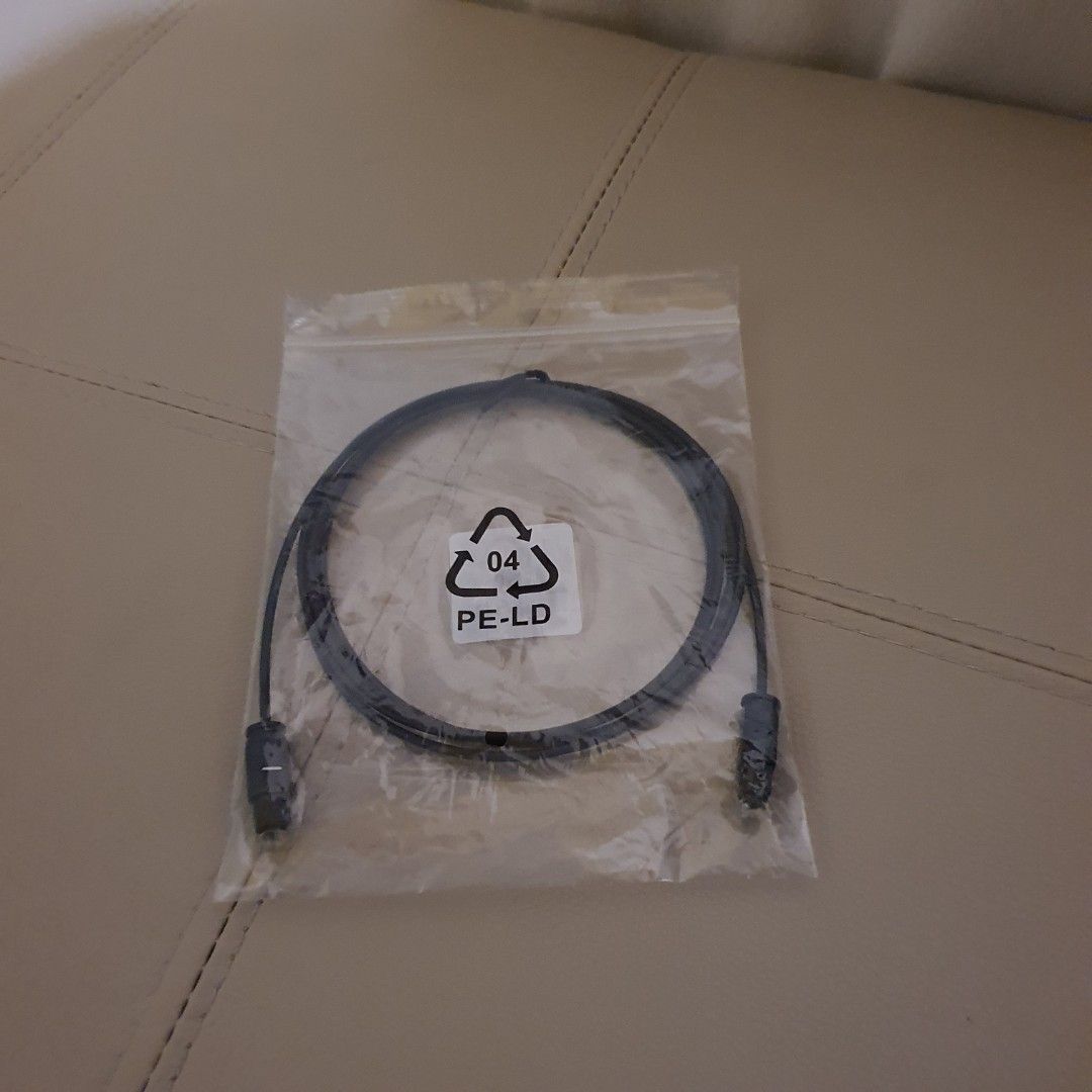 Digital Optical Audio Cable (Category: Other Audio Equipment) located in Pasig City. Submitted by mr.bargaindeal (Listing ID 1443263123, Image 2). Description: - Toslink digital optical audio cable - Connects your audio devices - Standard Toslink connectors on both ends - Black cable - Approximately 1 meter in length - Comes in original packaging - Perfect for home theater setups or connecting soundbars.
