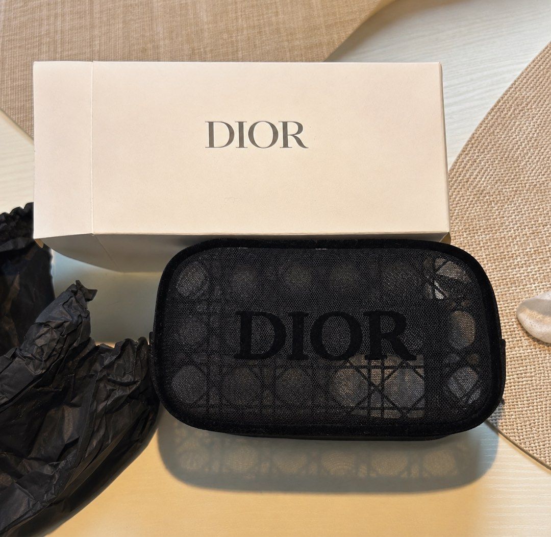 Dior Beauty Mesh Cosmetic Pouch GWP (Category: Luxury Bags & Wallets) located in Pasig City. Submitted by iamloveluxe (Listing ID 1439518343, Image 1). Description: - Authentic GWP Dior Beauty cosmetic pouch - Features the Dior logo - Black mesh material - Comes with original packaging (box and tissue paper) - 4 pcs available.