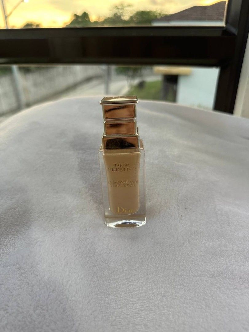Dior Prestige Light-In-White Foundation (Category: Makeup) located in Manila. Submitted by gentlebird_eb66e6 (Listing ID 1443249981, Image 1). Description: - Dior Prestige Light-In-White foundation - Shade: Light to medium beige - Finish: Natural, radiant - Packaging: Clear glass bottle with gold cap - Size: Ideal for travel and everyday use.