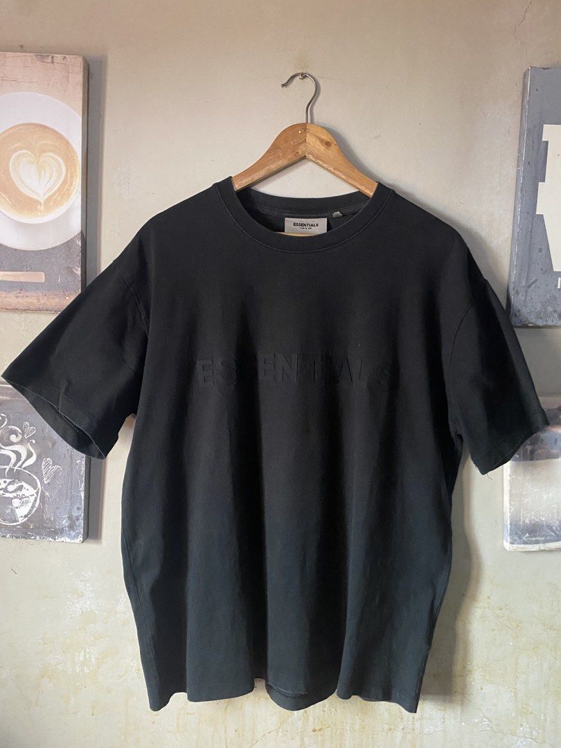 Fear of God Essentials Black T-Shirt Size M (Category: Tshirts & Polo Shirts ) located in Manila. Submitted by thrifttothecity (Listing ID 1443143074, Image 1). Description: Essentials Fear Of God Tee Med on tag 22 x 28 Excellent condition Color: Charcoal Black Issue: Small pinhole at the back see pictures .