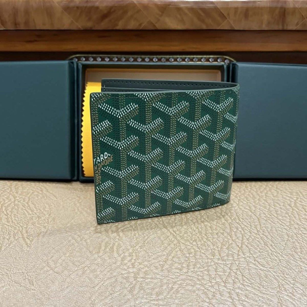 Goyard Bi-fold Wallet (Category: Luxury Bags & Wallets) located in Manila. Submitted by lichking416 (Listing ID 1443244333, Image 1). Description: - Classic Goyard wallet - Multiple card slots for ample storage - Available in stylish colors: green, white, blue, and burgundy - Ideal for everyday use, keeping cards and cash organized.