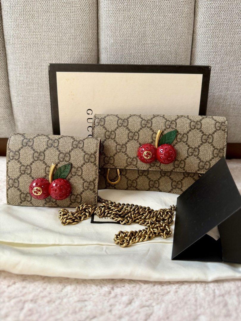 Gucci cherry (Category: Cross-body Bags) located in Manila. Submitted by aleon21 (Listing ID 1443238737, Image 1). Description: Sold as set with boxes 3 way bag cluth/sling and shoulder With wallet .