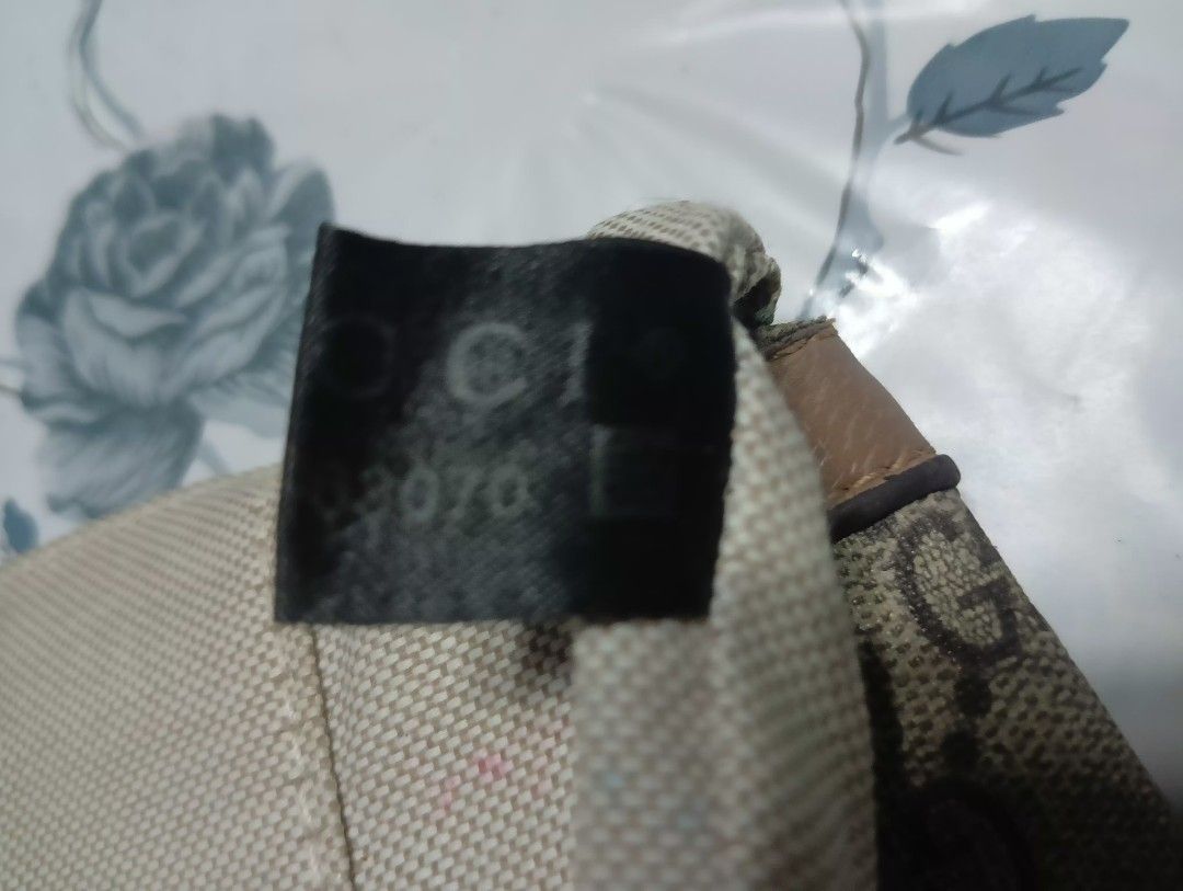 Gucci Monogram Wallet with Green and Red Stripe (Category: Luxury Bags & Wallets) located in Muntinlupa City. Submitted by cjcalcifier (Listing ID 1443274247, Image 2). Description: - Authentic Gucci wallet - Classic GG monogram canvas - Iconic green and red stripe detail - Small and portable size.