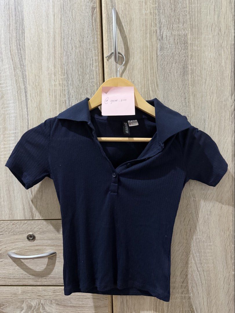 H&M Navy polo shirt (Category: Others Tops) located in Quezon City. Submitted by gem_210 (Listing ID 1443198688, Image 1). Description: > DM for more pictures.