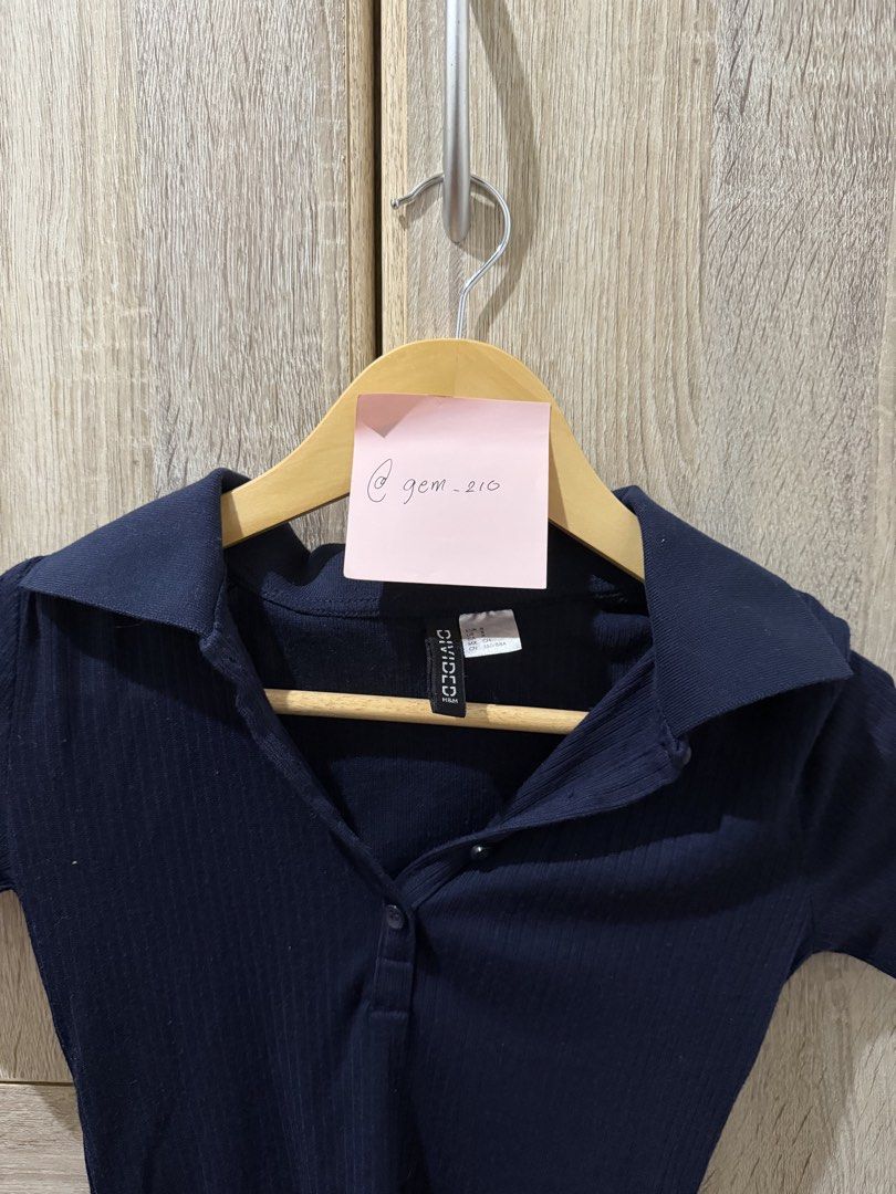 H&M Navy polo shirt (Category: Others Tops) located in Quezon City. Submitted by gem_210 (Listing ID 1443198688, Image 2). Description: > DM for more pictures.