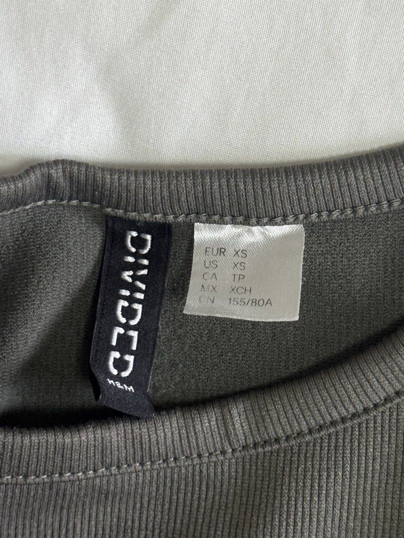 H&M Tops (Category: Shirts) located in Quezon City. Submitted by truecloud.1da3ab (Listing ID 1443245865, Image 3). Description: * ₱250 H&M gray crop top (S) * ₱200 H&M dark khaki ribbed corset-style tank top (XS).