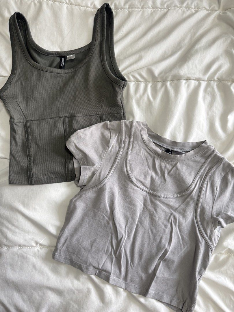 H&M Tops (Category: Shirts) located in Quezon City. Submitted by truecloud.1da3ab (Listing ID 1443245865, Image 1). Description: * ₱250 H&M gray crop top (S) * ₱200 H&M dark khaki ribbed corset-style tank top (XS).