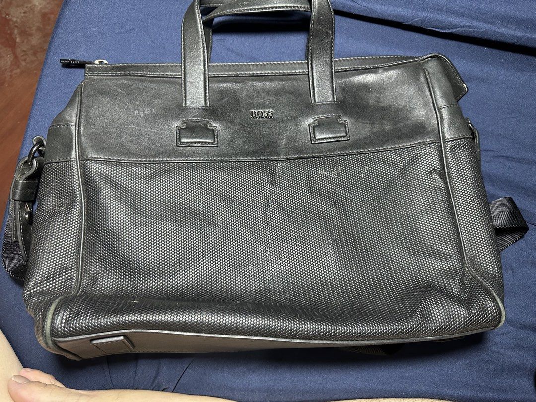 HUGO BOSS laptop bag (Category: Laptop Bags & Sleeves) located in Quezon City. Submitted by bart.anonuevo (Listing ID 1443221635, Image 1). Description: Hugo Boss laptop bag 100% real leather(Calf skin) Original, bought by my dad at BOSS Greenbelt Serial number is posted in the photo for authenticity check *All zippers are good *No damaged leather *Bag only needs cleaning Rfs: declutter Price: P15,000 negotiable Mode of payment: Gcash or Maya Via
