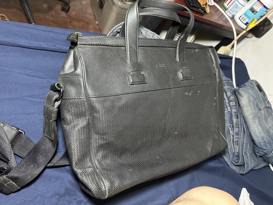 HUGO BOSS laptop bag (Category: Laptop Bags & Sleeves) located in Quezon City. Submitted by bart.anonuevo (Listing ID 1443221635, Image 2). Description: Hugo Boss laptop bag 100% real leather(Calf skin) Original, bought by my dad at BOSS Greenbelt Serial number is posted in the photo for authenticity check *All zippers are good *No damaged leather *Bag only needs cleaning Rfs: declutter Price: P15,000 negotiable Mode of payment: Gcash or Maya Via