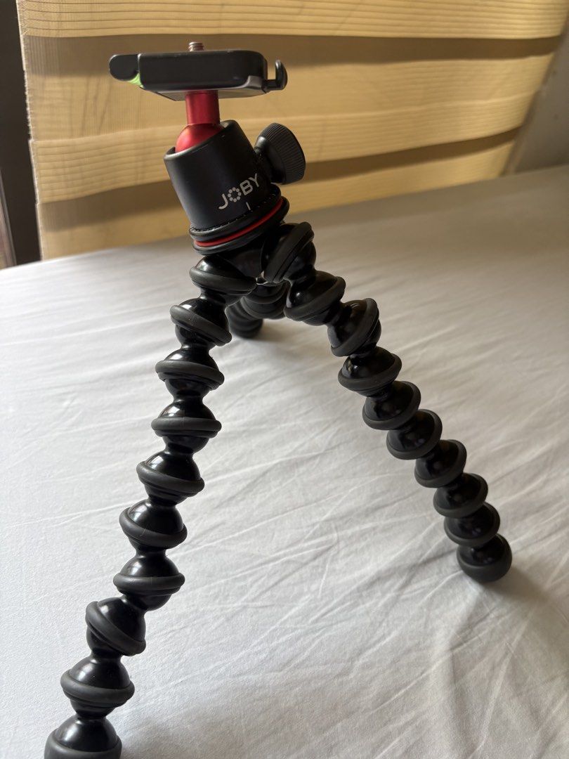 JOBY GorillaPod Flexible Tripod (Category: Tripods & Monopods) located in Muntinlupa City. Submitted by take2mnl (Listing ID 1443226039, Image 1). Description: - JOBY flexible tripod - Works with cameras and smartphones - Bendable legs can wrap around objects - Stands stable on uneven surfaces - Compact and portable for travel - Ideal for photography and vlogging.