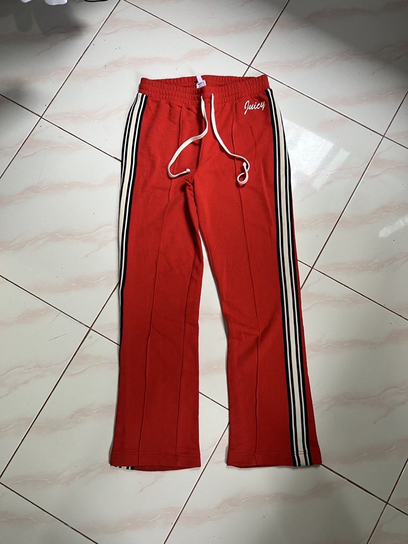 Juicy Couture Red Track Pants with Side Stripes (Category: Other Bottoms) located in Panabo. Submitted by gleojan (Listing ID 1443208901, Image 1). Description: Juicy Couture red track pants, size XS. Features classic black & white side stripes and an elastic drawstring waist. Perfect for comfy casual wear. Size 30 x 38 length .