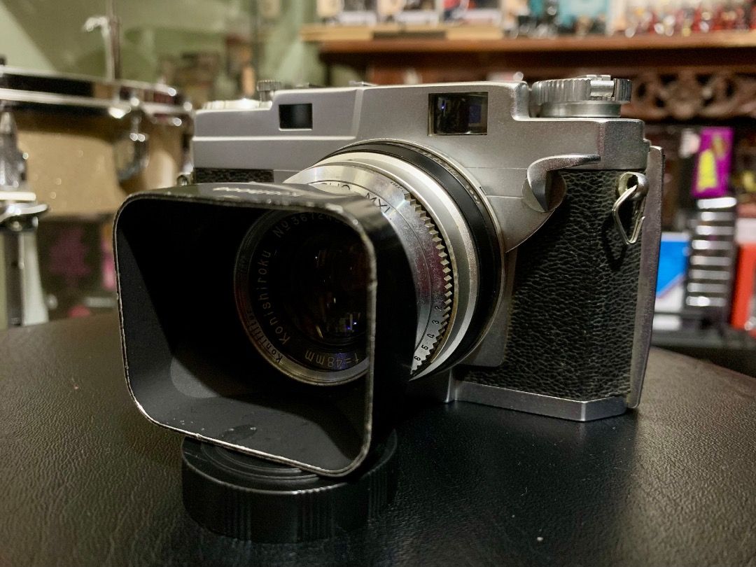 Konica III rangefinder 35mm film camera (Category: Cameras) located in Manila. Submitted by gepmacadaeg (Listing ID 1443225775, Image 3). Description: - Camera is in very good shape. - Lens, viewfinder, and rangefinder patch are very clear. - Comes with Konifilter, Konihood, and lens cap. - Advance lever does not spring back fully to rest position, but you can just push it back, or reconnect the spring..