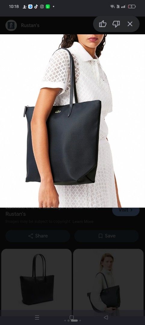 Lacoste Black Nylon Tote Bag (Category: Tote Bags) located in Talibon. Submitted by saysonlest75795 (Listing ID 1443266986, Image 1). Description: - Classic black Lacoste tote bag - Iconic green crocodile logo on front - Secure zip closure - Spacious interior for essentials - Ideal for everyday use or travel - excellent condition - issue sign of usage sa Handle - check Pic.