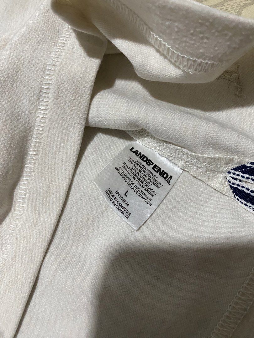 Lands' End Men's T-Shirt Size L Light Grey (Category: Tshirts & Polo Shirts ) located in Subic. Submitted by raeux (Listing ID 1443218946, Image 3). Description: - Brand: Lands' End - Color: Light Grey - Size: L - Design: Small embroidered lighthouse logo on front bottom left - Condition: Good, with a couple of small marks on the front (shown in photos) - Ideal for: Casual wear.