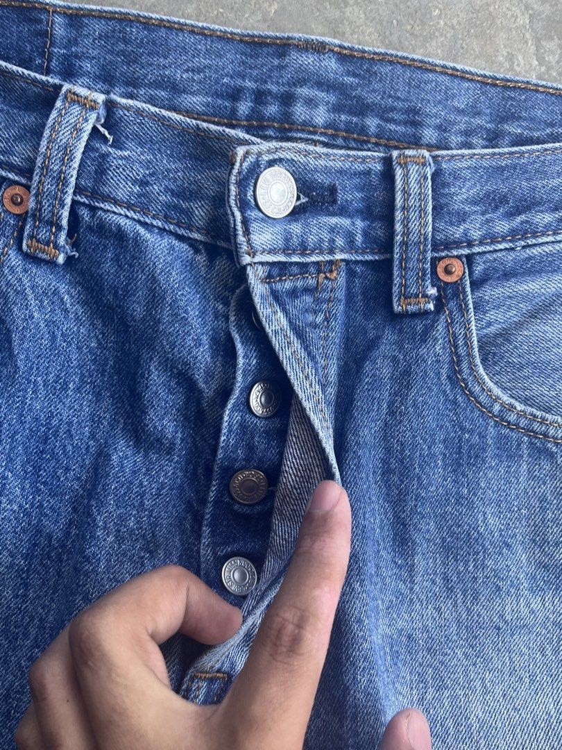 Levi's 501 Cut-Off Denim Shorts (Category: Shorts) located in San Mariano. Submitted by rakithrift (Listing ID 1443248077, Image 3). Description: - Classic Levi's 501 denim shorts - Cut-off style with frayed hem - Button fly closure - Medium blue wash with fading - Essential casual wear staple 📏 DIMES: W 32 L 20.5 T 11.5 H 9 🎨 COLOR RATE: 9/10 ✅ CONDITION: WELL USED ❌ ISSUE: ALTERED (pants to jorts), stains.