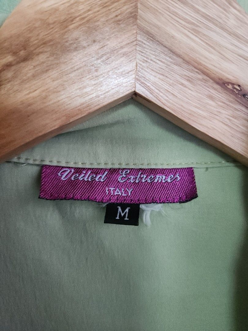 Light green polo (Category: Coats, Jackets and Outerwear) located in Makati City. Submitted by abbydeclutters (Listing ID 1443291436, Image 2). Description: - thrifted lightweight polo made in italy. Really nice material - Size: M but best fits small - Color: Light beige - Issue: No buttons (i used it as a cover up before) .