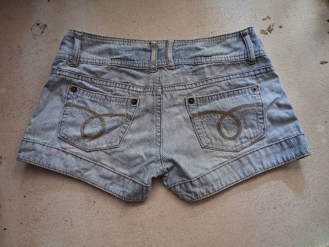 Light Wash Striped Denim Shorts (Category: Shorts) located in Cabanatuan. Submitted by ronnelpena (Listing ID 1443168637, Image 2). Description: - Cute light wash denim shorts - Subtle vertical stripe pattern - Button and zip front closure - Two back pockets with decorative stitching - Cuffed hem with button detail - Ideal for casual wear.