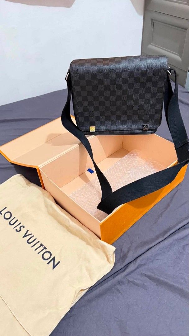 Louis Vuitton Damier Graphite District PM Black Medium Bag (Category: Luxury Bags & Wallets) located in Manila. Submitted by rafaeljoaq97967 (Listing ID 1443255940, Image 1). Description: - Authentic Louis Vuitton Messenger Bag - Damier Graphite District PM Black - Adjustable Shoulder Strap - Includes Original Dust Bag and Box - Ideal for Daily Use.