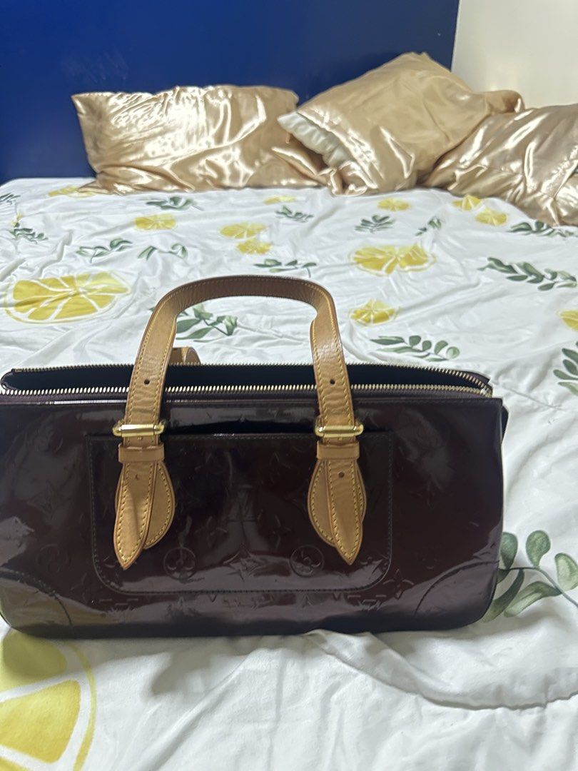 Louis Vuitton Monogram Vernis Alma PM (Category: Luxury Bags & Wallets) located in Manila. Submitted by clevermountain.c4ec99 (Listing ID 1443163608, Image 2). Description: - CODED - Authentic Louis Vuitton Alma PM - Monogram Vernis leather in deep burgundy - Classic shape with top handles - Secure zipper closure - Interior pocket for essentials - Made in France.