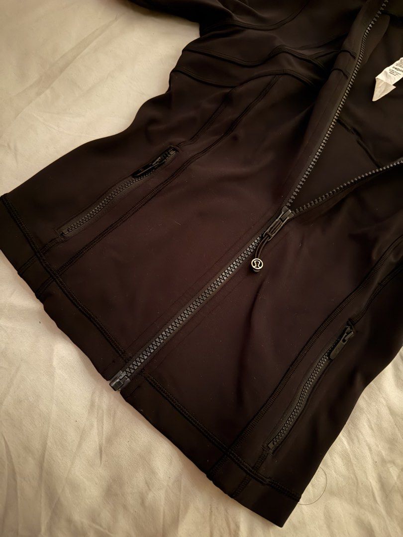 Lululemon Define Cropped Jacket Size 4 (Category: Coats, Jackets and Outerwear) located in Valenzuela. Submitted by solanaph (Listing ID 1443139667, Image 3). Description: - Personal item. Bought from pasabuy last 2024 - Black Lululemon jacket - Features thumbholes in sleeves - Two zippered pockets for secure storage - Full zip closure for easy on/off - Versatile for workouts and everyday wear Negotiable.