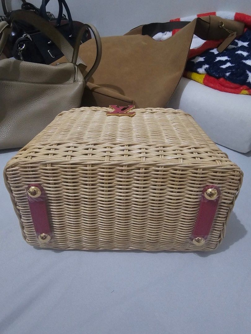 LV Capucines Woven Bag (Category: Luxury Bags & Wallets) located in Quezon City. Submitted by dhexyoblepias (Listing ID 1443141759, Image 3). Description: - Authentic Louis Vuitton woven bag - Features a stylish pink leather handle - Comes with a detachable pink leather strap with gold hardware - Elegant woven exterior with pink leather accents - Ideal for your summer adventures - Includes original Louis Vuitton dust bag.