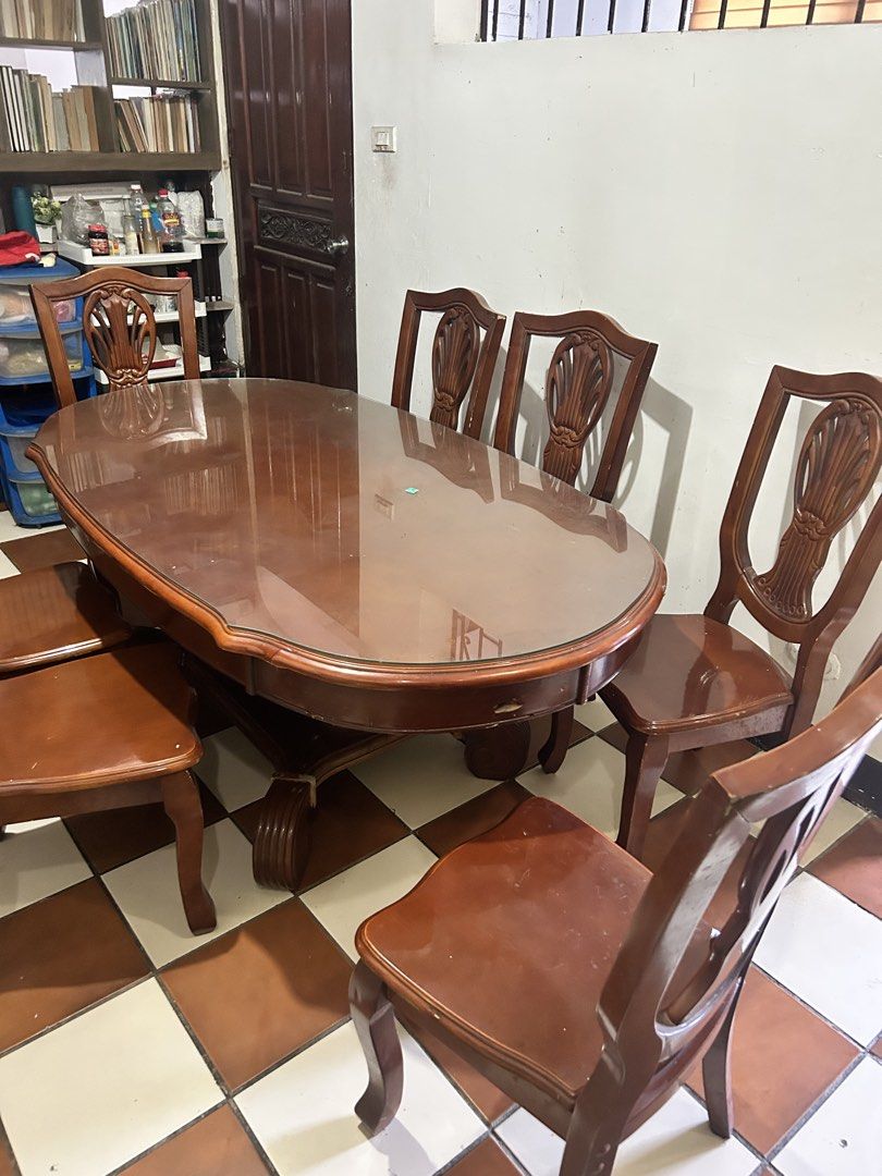 Mahogany Dinning Table with 7 chairs (Category: Tables & Sets) located in Manila. Submitted by Tjuan13 (Listing ID 1443137334, Image 2). Description: Secondhand Mahogany Dinning Table with 7 chairs for only Php 25,000 -No Issue -Actual photo posted -Ready to use -Rfs di na ginagamit moving out -Free Shipping Fee via Lalamove or Pick up -This is Negotiable -Same day delivery -Cash on delivery Message me using my Smart Number (09297698976) or DM fo