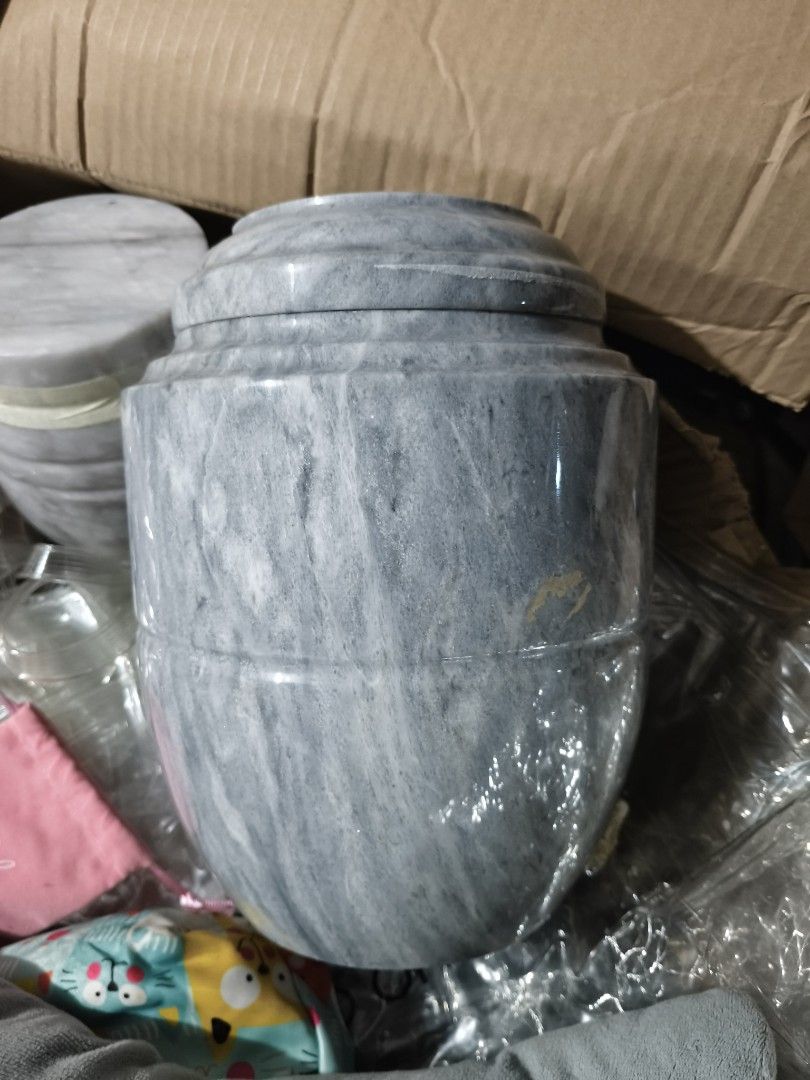 Marble Urn with Lid (Category: Everything Else Others) located in Del Monte. Submitted by anitagalan89774 (Listing ID 1443250326, Image 1). Description: - Unique grey and white marbled pattern - Classic, timeless urn shape - Includes a lid - Ideal for display or storage.